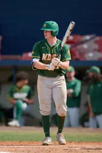 North Dakota State Bison first baseman Brock Anderson (11) bats during an NCAA baseball game against the Maine Black Bears on March 11, 2022 at Chain of Lakes Stadium in Winter Haven, Florida. (Mike Janes/Four Seam Images)