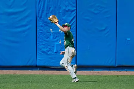 North Dakota State Bison outfielder Cadyn Schwabe (19) catches a fly ball during an NCAA baseball game against the Maine Black Bears on March 11, 2022 at Chain of Lakes Stadium in Winter Haven, Florida. (Mike Janes/Four Seam Images)