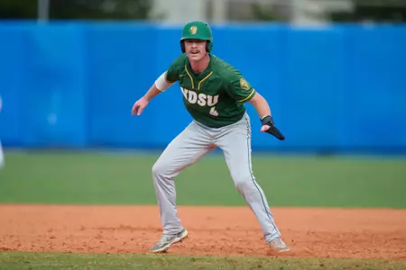 North Dakota State Bison Charley Hesse (4) leads off during an NCAA baseball game against the Maine Black Bears on March 11, 2022 at Chain of Lakes Stadium in Winter Haven, Florida. (Mike Janes/Four Seam Images)