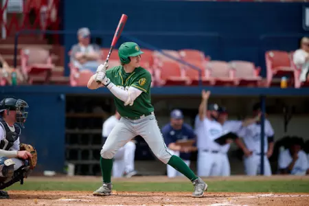 North Dakota State Bison third baseman Garret Hill (9) bats during an NCAA baseball game against the Maine Black Bears on March 11, 2022 at Chain of Lakes Stadium in Winter Haven, Florida. (Mike Janes/Four Seam Images)