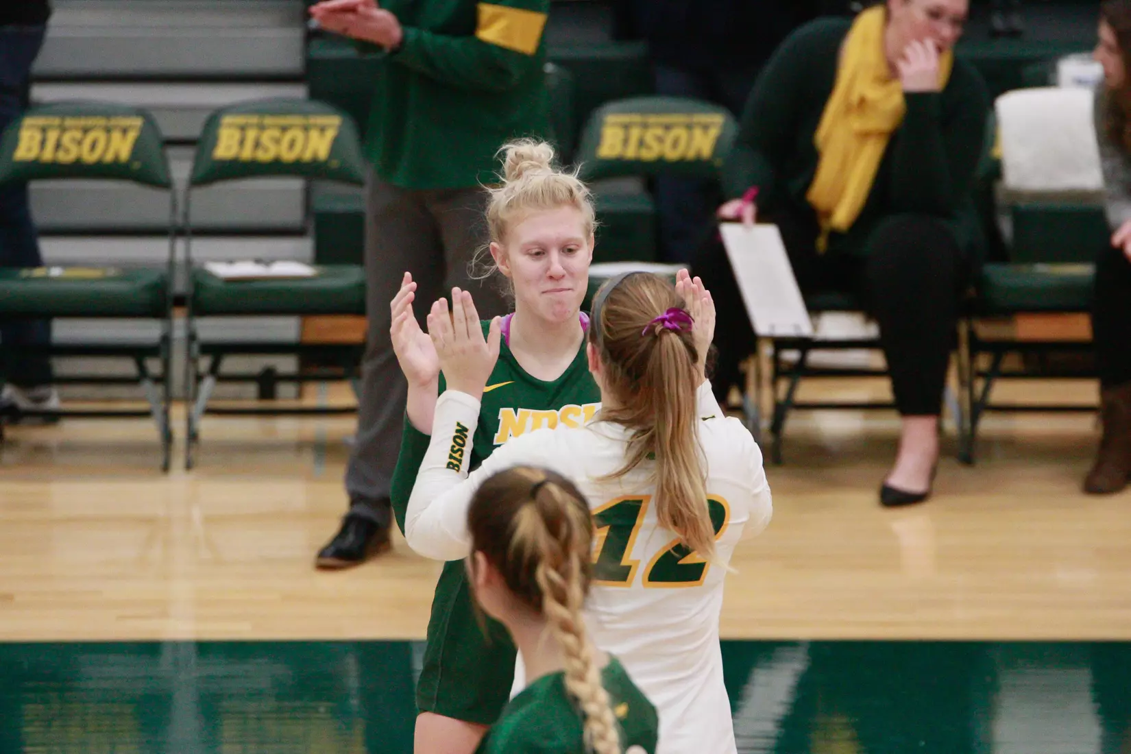 North Dakota State's Kalli Hegerle and Kaylee Hanger against Denver in the Bentson Bunker Fieldhouse.