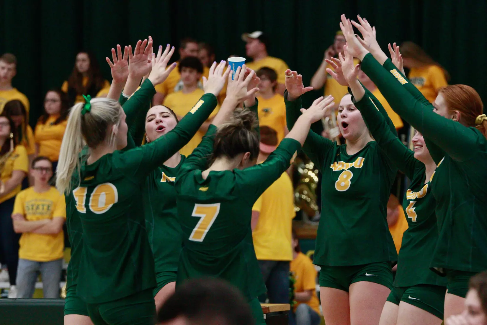North Dakota State on-court huddle during match against Denver in the Bentson Bunker Fieldhouse.