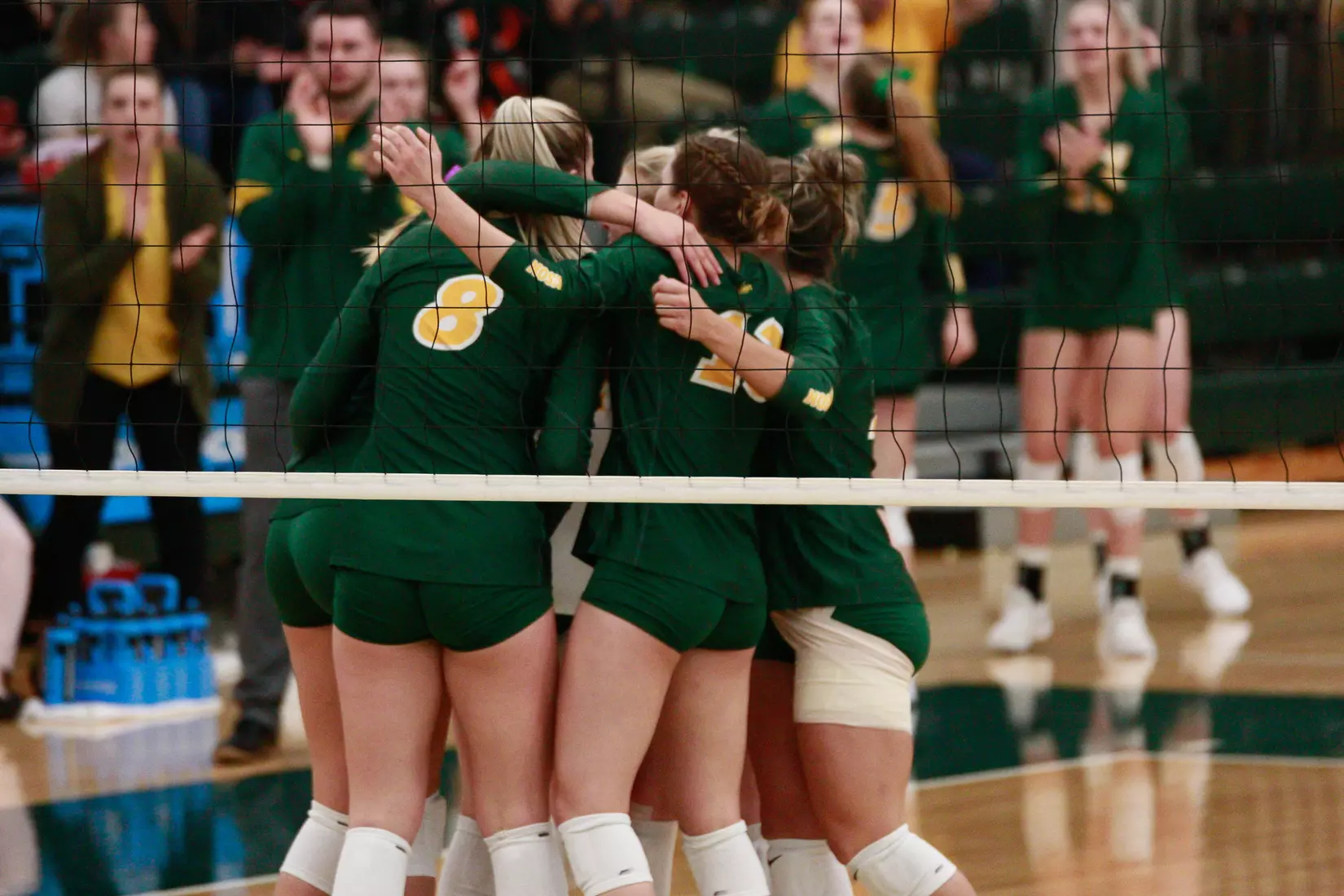 North Dakota State on-court huddle during match against Denver in the Bentson Bunker Fieldhouse.