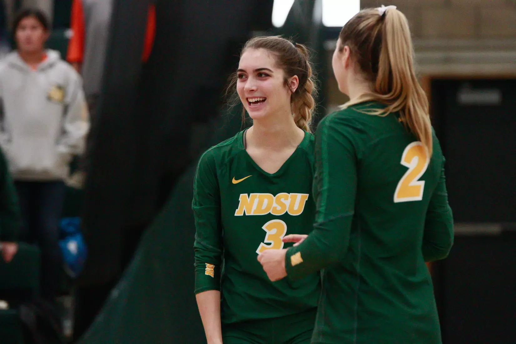 North Dakota State's Syra Tanchin and Allie Mauch against Denver in the Bentson Bunker Fieldhouse.