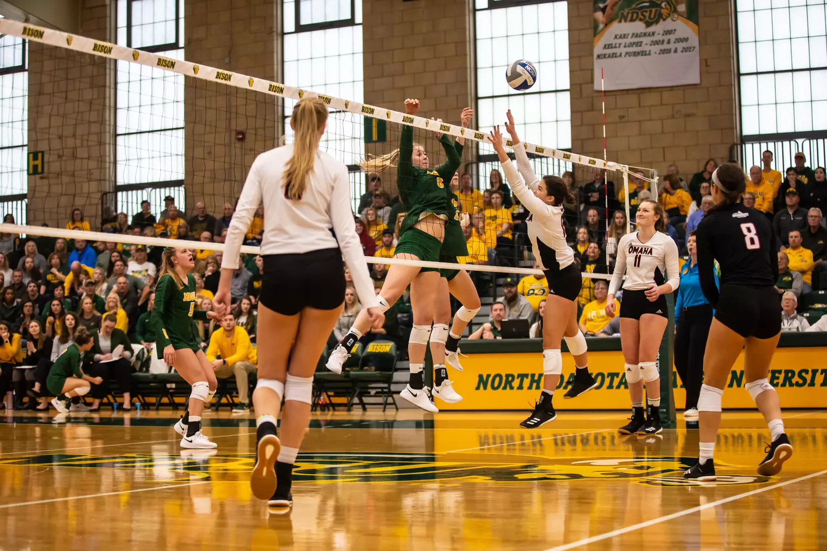 North Dakota State's Bella Lien and Alexis Bachmeier against Omaha in the Bentson Bunker Fieldhouse.