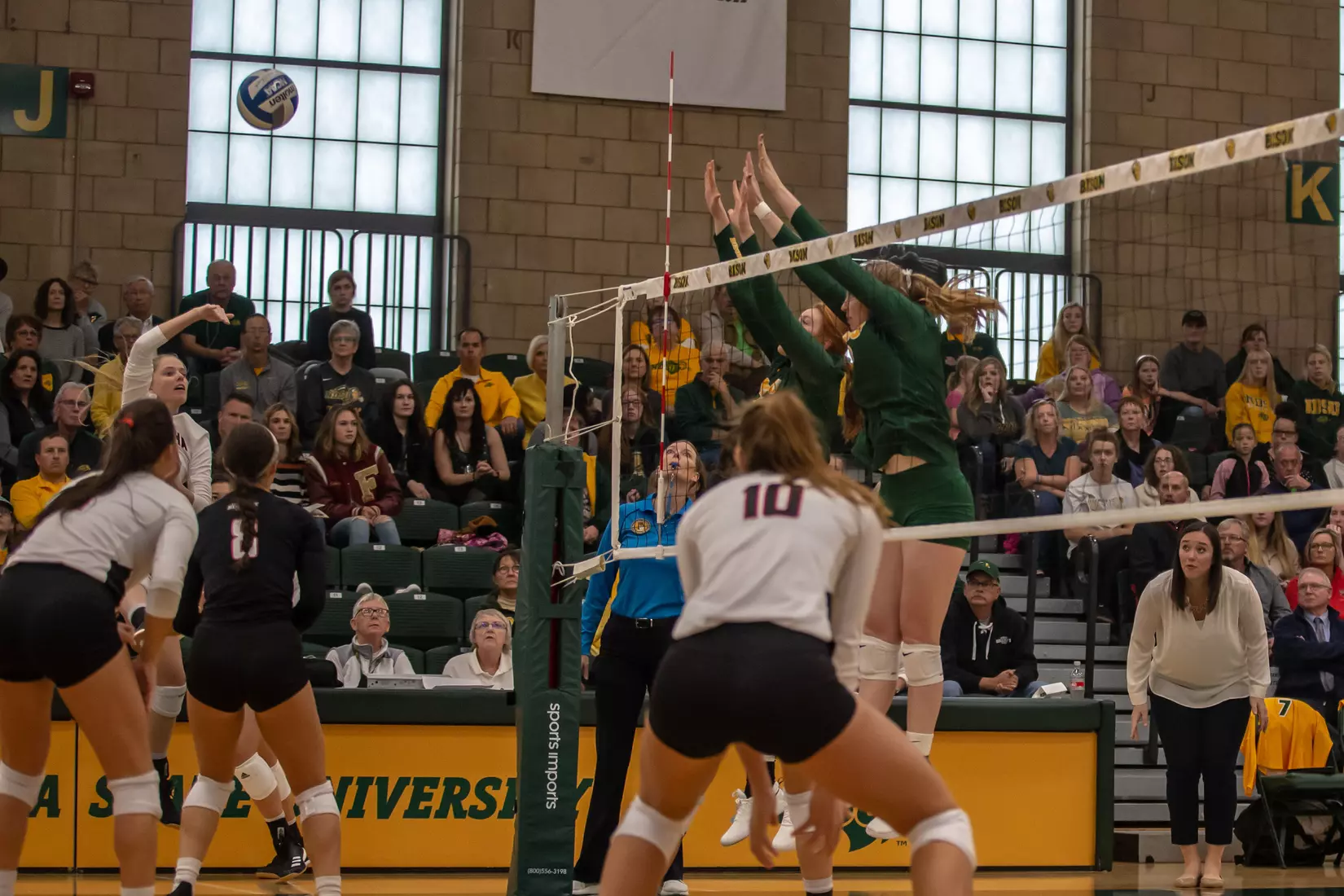 North Dakota State's Kirstin Tidd and Emily Halverson against Omaha in the Bentson Bunker Fieldhouse.