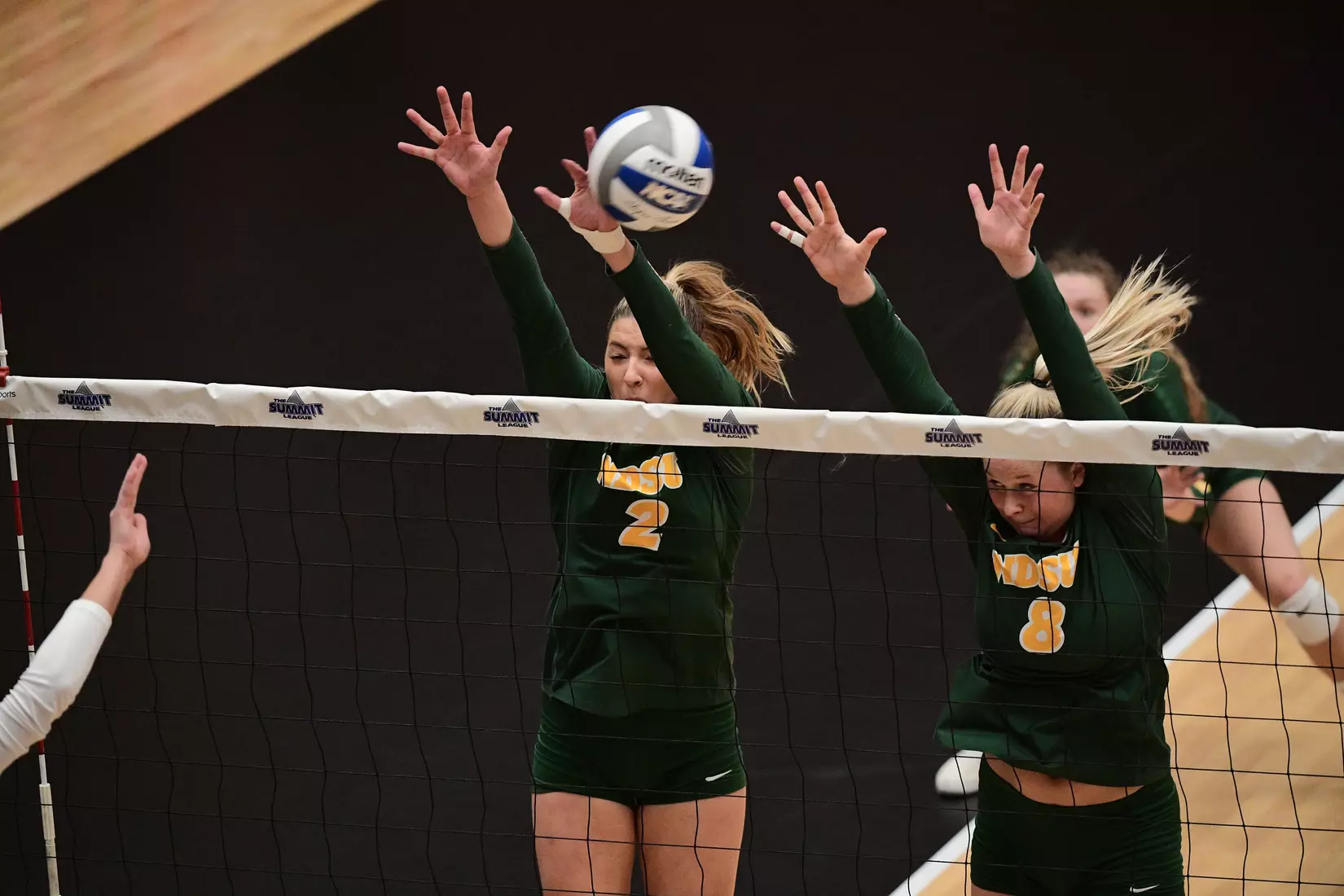 North Dakota State outside hitter Allie Mauch and middle hitter Bella Lien during the Summit League tournament quarterfinal against Omaha on Nov. 22 in Denver.