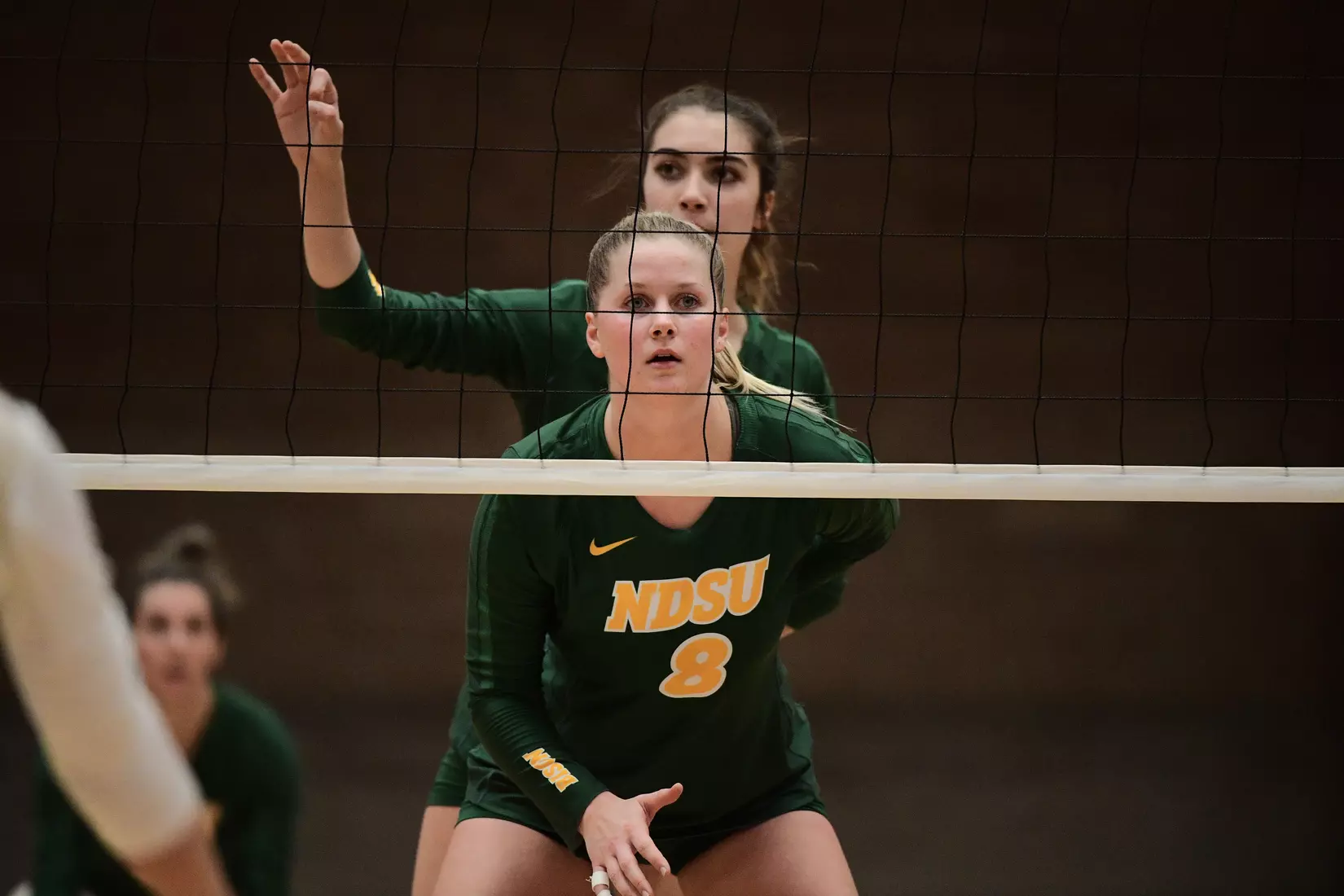 North Dakota State middle hitter Bella Lien (front) and outside hitter Syra Tanchin during the Summit League tournament quarterfinal against Omaha on Nov. 22 in Denver.