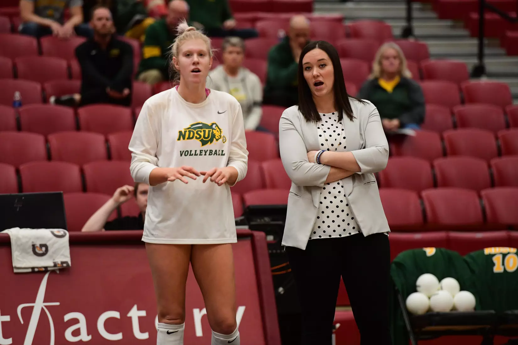 North Dakota State setter Kalli Hegerle and head coach Jennifer Lopez prior to the Summit League tournament quarterfinal against Omaha on Nov. 22 in Denver.