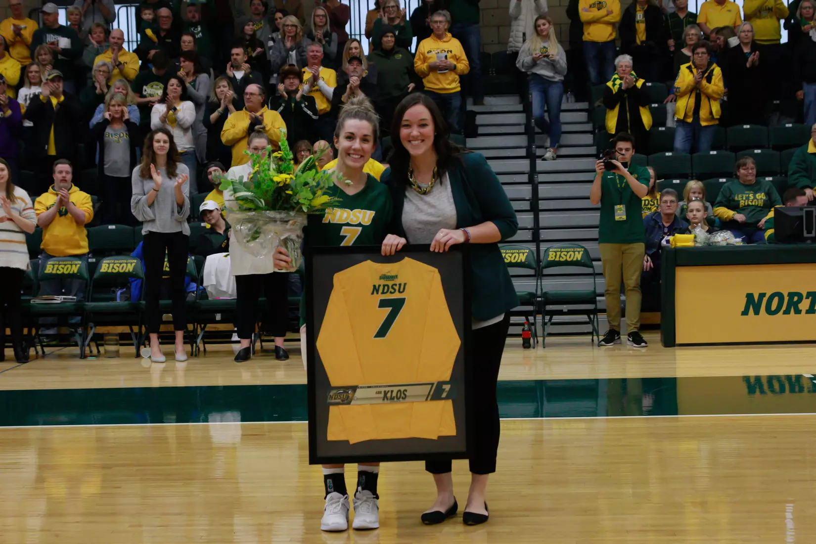 North Dakota State senior Abbi Klos and head coach Jennifer Lopez prior to Bison 3-1 win over Oral Roberts on Nov. 17 in Bentson Bunker Fieldhouse.