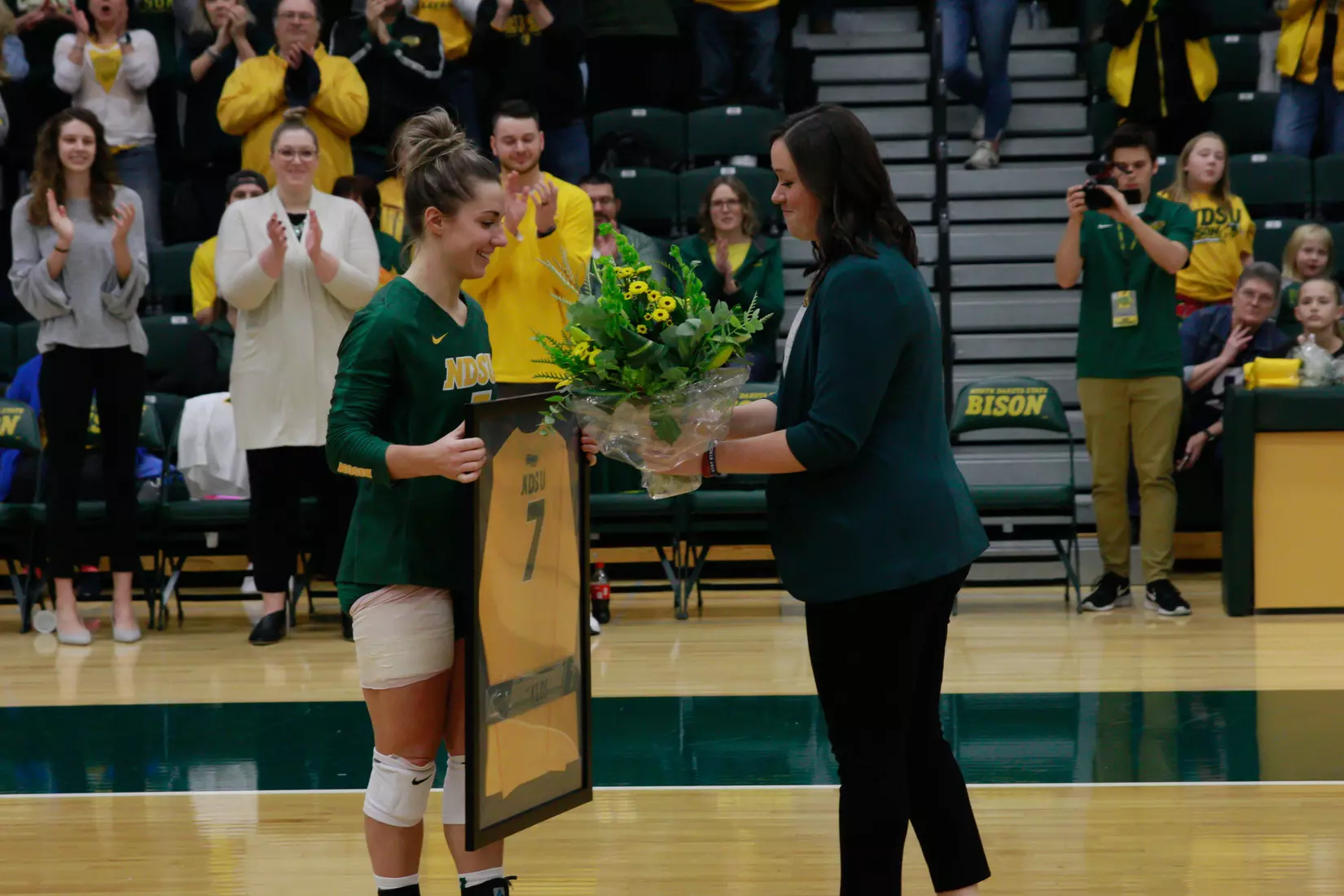 North Dakota State senior Abbi Klos and head coach Jennifer Lopez prior to Bison 3-1 win over Oral Roberts on Nov. 17 in Bentson Bunker Fieldhouse.