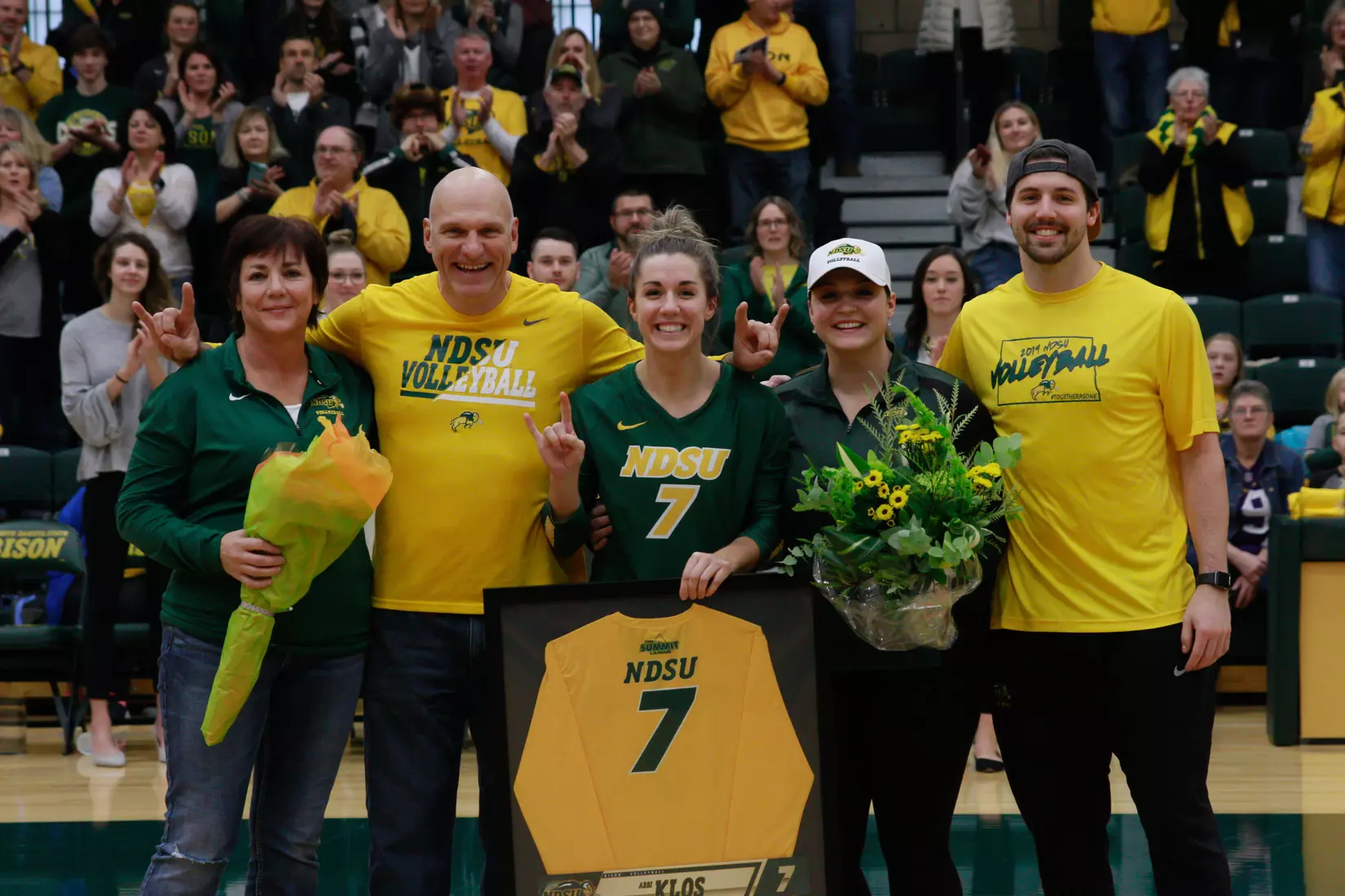 North Dakota State senior Abbi Klos and family prior to Bison 3-1 win over Oral Roberts on Nov. 17 in Bentson Bunker Fieldhouse.