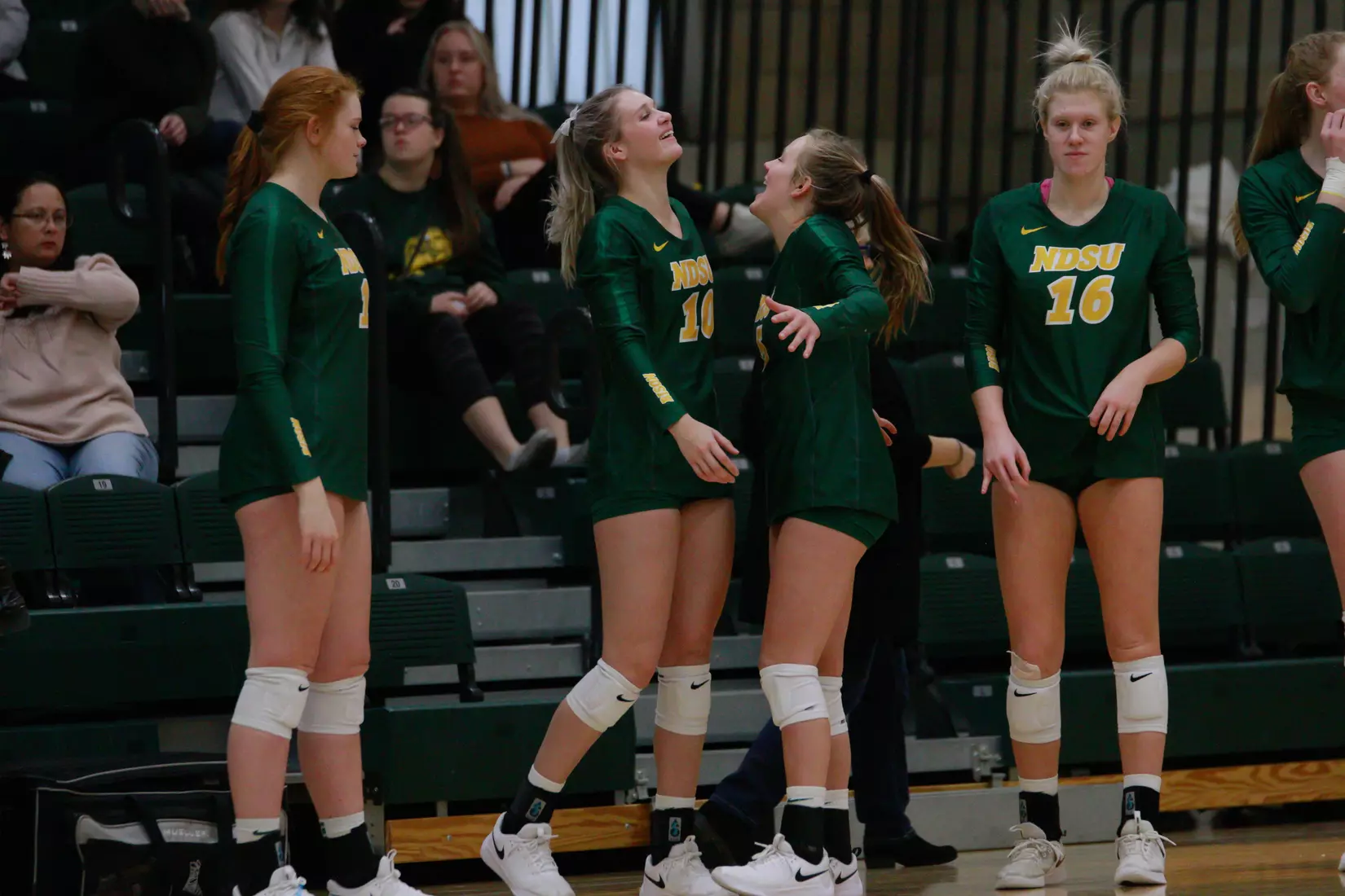 North Dakota State sophomore Maggie Steffen and freshman Ava Schmoll on sideline during 3-1 win over Oral Roberts on Nov. 17 in Bentson Bunker Fieldhouse.