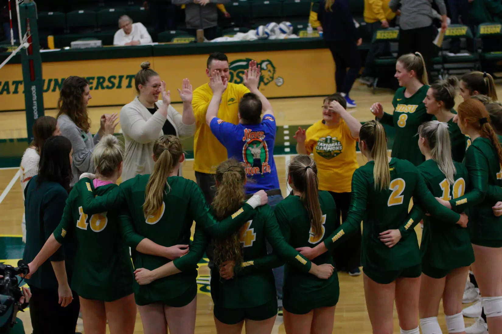North Dakota State volleyball post-match huddle following 3-1 win over Oral Roberts on Nov. 17 in Bentson Bunker Fieldhouse.