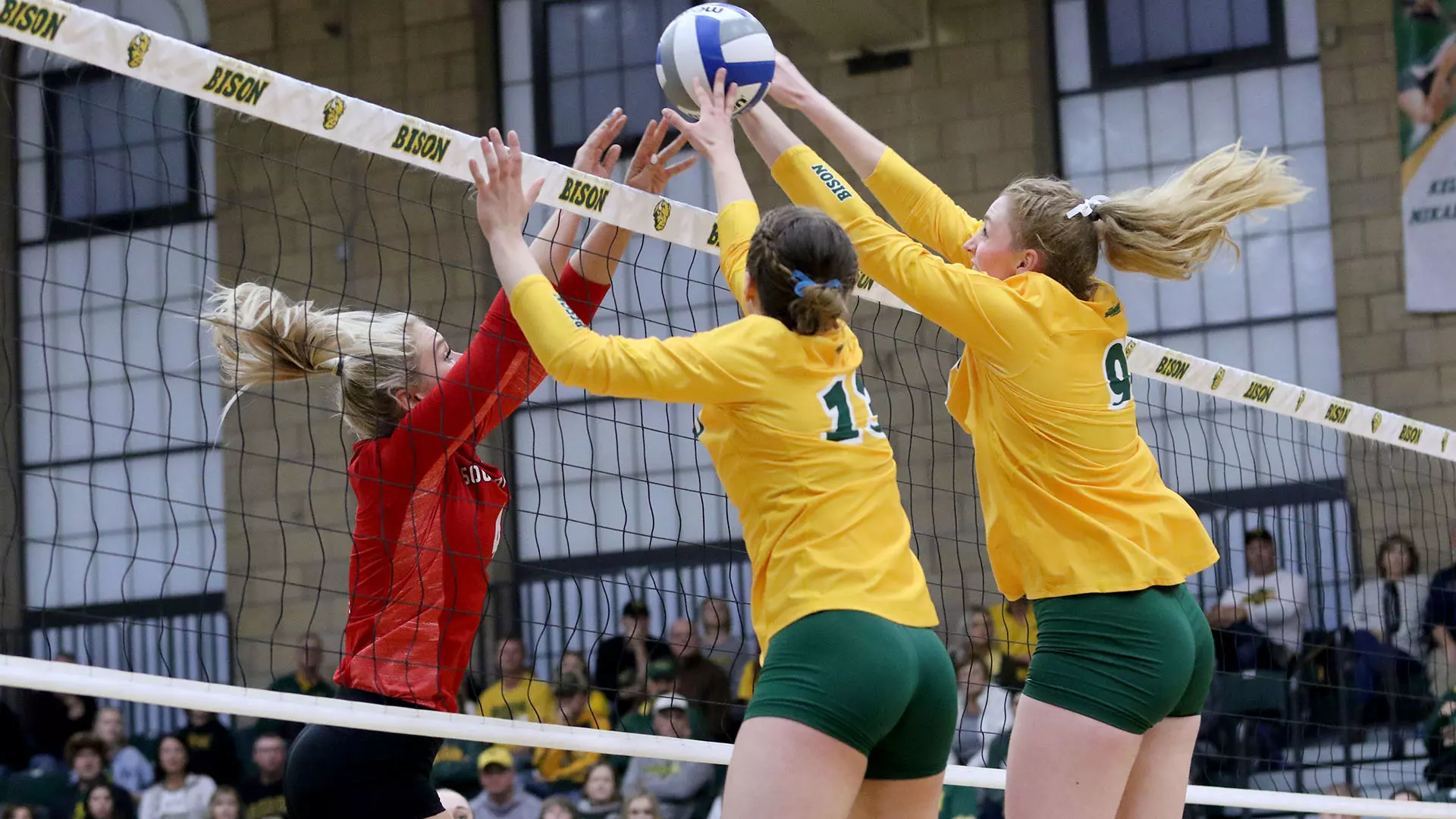 North Dakota State's Alexis Bachmeier and Emily Halverson against South Dakota in the Bentson Bunker Fieldhouse.