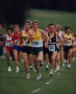 Doug Hanson leads pack of cross country runners