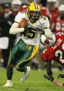 Record Crowd Watches No. 4 North Dakota State Defeat SDSU 41-28 to Claim GWFC Title Image
