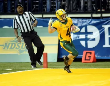 Ryan Smith scores on an 85-yard punt return