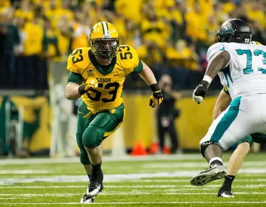 Right defensive end Kyle Emanuel rushes from the edge.