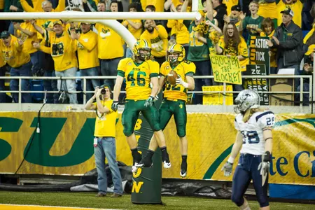 Andrew Bonnet and Zach Vraa celebrate after a touchdown.