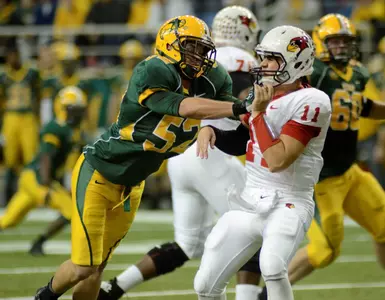 Travis Beck pressures the quarterback.
