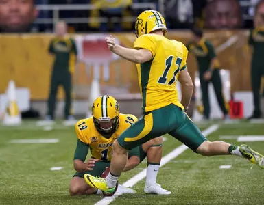 Adam Keller kicks, Ben LeCompte holds