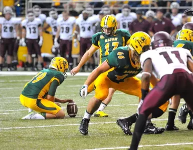 Ben LeCompte (19) holds for Adam Keller (17)