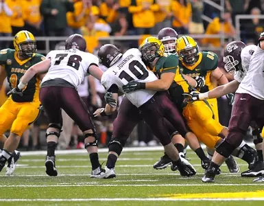 Brad Ambrosius hits the quarterback