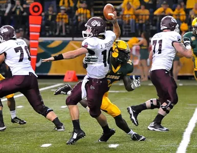 Carlton Littlejohn hits the quarterback