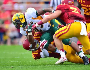 John Crockett leans for extra yardage.