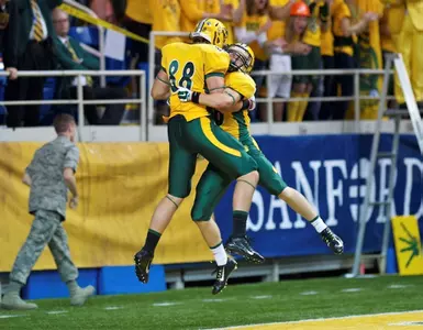 Luke Albers (88) and RJ Urzendowski (16) celebrate