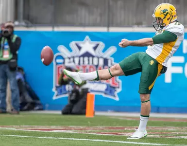 Ben LeCompte punts from end zone