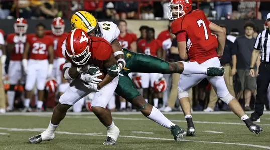 Linebacker Jabril Cox makes a tackle for minus-5 yards in overtime