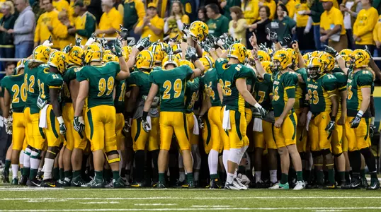 NDSU huddles up before the opening kickoff.