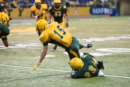 Jaylaan Wimbush tackles wide receiver Daniel Polansky