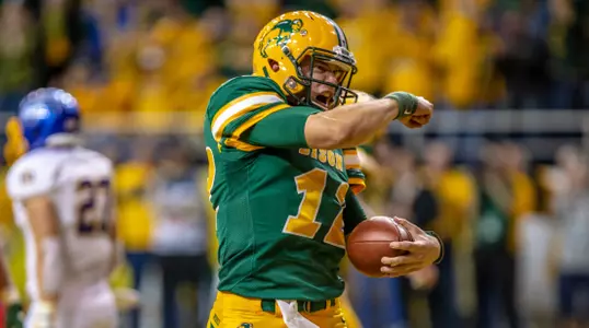 Easton Stick pumps his fist after a touchdown