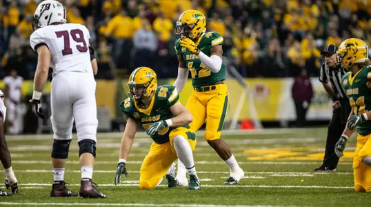 Jabril Cox and Cole Karcz line up for a play