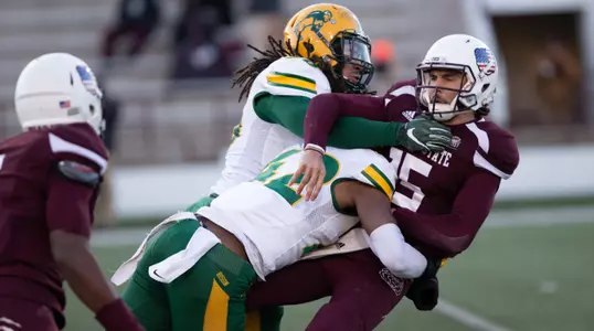 Greg Menard and Jabril Cox sack the Missouri State quarterback