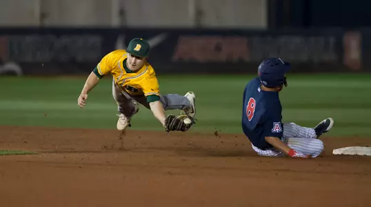 North Dakota State University Bison second baseman Drew Fearing (14) prevents a ball from going into the outfield during a game against the University of Arizona Wildcats at Hi Corbett Field on March 9, 2018 in Tucson, Arizona. (Zachary Lucy Photography)