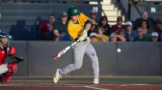 North Dakota State University Bison second baseman Drew Fearing (14) follows through on his swing during a game against the University of Arizona Wildcats at Hi Corbett Field on March 9, 2018 in Tucson, Arizona. (Zachary Lucy Photography)