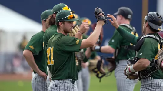 North Dakota State University Bison outfielder Logan Busch (11) and his NDSU teammates before a game against the University of Arizona Wildcats at Hi Corbett Field on March 11, 2018 in Tucson, Arizona. (Zachary Lucy Photography)