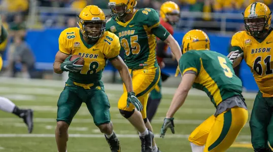 Adam Cofield rushing the football