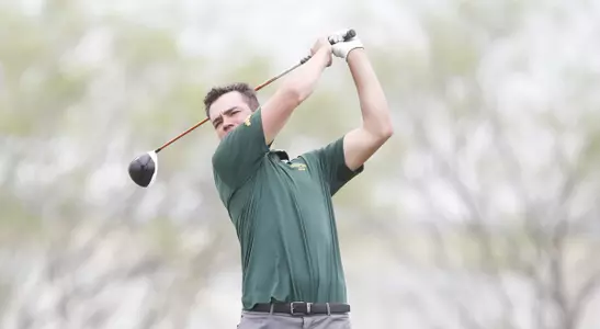 Photo of Van Holmgren finishing a golf swing