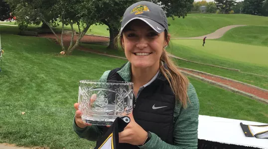 Taylor McCorkle with champion's trophy at Finkbine Golf Course
