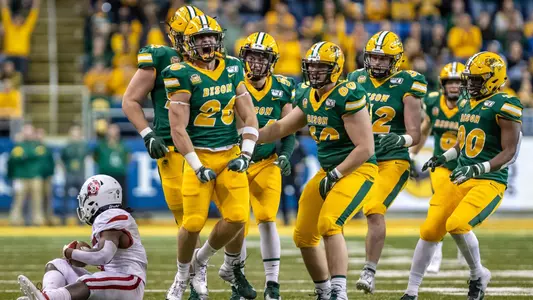 James Kaczor and the Bison defense celebrate
