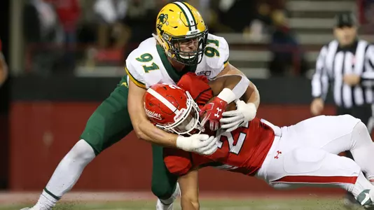 Derrek Tuszka makes a tackle