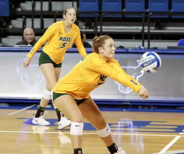 Kaylee Hanger pass volleyball forward against Buffalo during the Blue & White Classic.