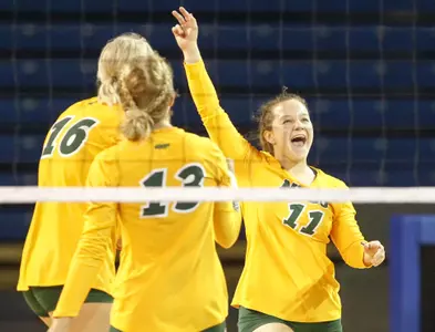 Paige Schaffer celebrates following a service ace against Buffalo during the Blue & White Classic.