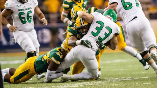 Aaron Mercadel tackles James Johannesson