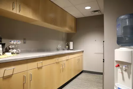 Kitchenette cabinets and water cooler